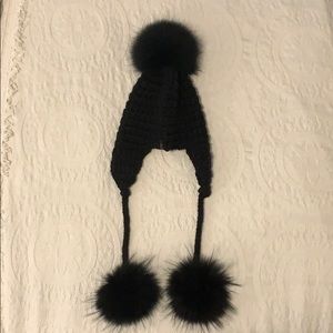 RUDSAK raccoon fur toque